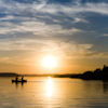 Friend AR_Jones personal Image - fishing boat on a lake at sunset